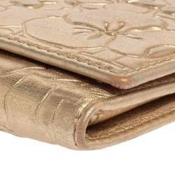 Pre Owned Carolina Herrera Gold Floral Embossed Leather Trifold Continental Wallet