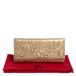 Pre Owned Carolina Herrera Gold Floral Embossed Leather Trifold Continental Wallet