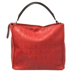 Pre Owned Carolina Herrera Red Monogram Embossed Leather Tassel Hobo