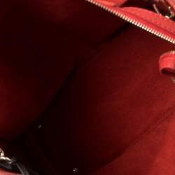 Pre Owned Carolina Herrera Red Monogram Embossed Leather Tassel Hobo