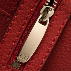 Pre Owned Carolina Herrera Red Monogram Embossed Leather Tassel Hobo