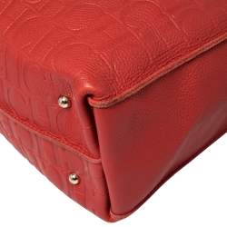 Pre Owned Carolina Herrera Red Monogram Embossed Leather Tassel Hobo