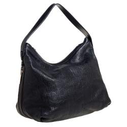 Pre Owned Carolina Herrera Black Monogram Embossed Leather Expandable Hobo