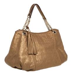 Carolina Herrera Golden Brown Monogram Embossed Leather Tassel Hobo