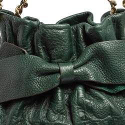 Pre Owned Carolina Herrera Dark Green Monogram Embossed Leather Bow Bucket Shoulder Bag