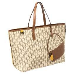 Pre Owned Carolina Herrera Beige/Brown Monogram Coated Canvas and Leather Charm Tote