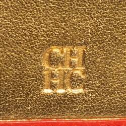 Pre Owned Carolina Herrera Orange Embossed Leather Bow Trifold Wallet