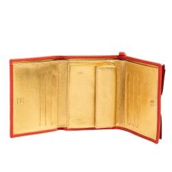 Pre Owned Carolina Herrera Orange Embossed Leather Bow Trifold Wallet