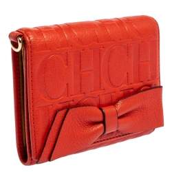 Pre Owned Carolina Herrera Orange Embossed Leather Bow Trifold Wallet