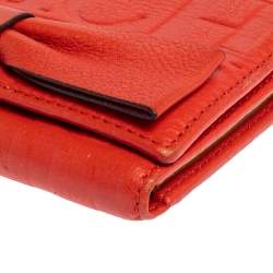 Pre Owned Carolina Herrera Orange Embossed Leather Bow Trifold Wallet