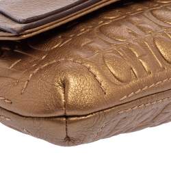 Pre Owned Carolina Herrera Gold Monogram Embossed Leather Bow Chain Clutch