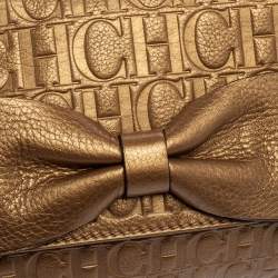 Pre Owned Carolina Herrera Gold Monogram Embossed Leather Bow Chain Clutch