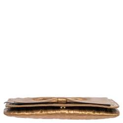 Pre Owned Carolina Herrera Gold Monogram Embossed Leather Bow Chain Clutch