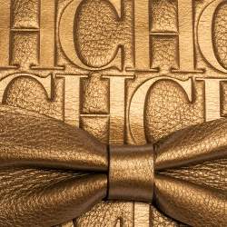 Pre Owned Carolina Herrera Gold Monogram Embossed Leather Bow Chain Clutch