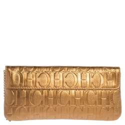 Pre Owned Carolina Herrera Gold Monogram Embossed Leather Bow Chain Clutch
