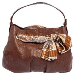 Pre Owned Carolina Herrera Brown Monogram Embossed Leather Scarf Hobo