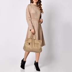 Pre Owned Carolina Herrera Beige Monogram Embossed Leather Drawstring Tote