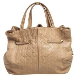 Pre Owned Carolina Herrera Beige Monogram Embossed Leather Drawstring Tote