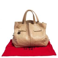 Pre Owned Carolina Herrera Beige Monogram Embossed Leather Drawstring Tote