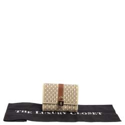 Pre Owned Carolina Herrera Beige/Brown Monogram Coated Canvas Flap Compact Wallet
