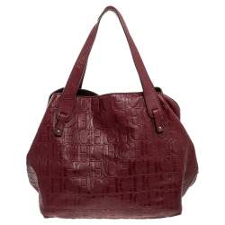 Pre Owned Carolina Herrera Burgundy Monogram Embossed Leather Middle Zip Satchel