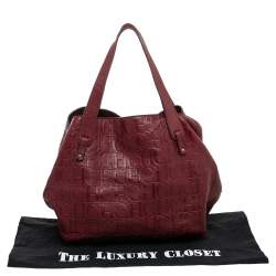 Pre Owned Carolina Herrera Burgundy Monogram Embossed Leather Middle Zip Satchel
