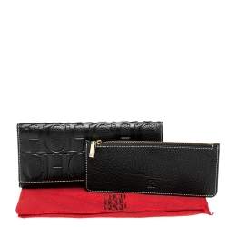 Pre Owned Carolina Herrera Black Monogram Embossed Leather Trifold Continental Wallet