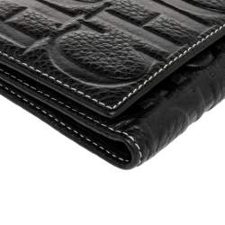 Pre Owned Carolina Herrera Black Monogram Embossed Leather Trifold Continental Wallet