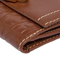 Pre Owned Carolina Herrera Tan Monogram Leather Matryoshka Lock Compact Wallet