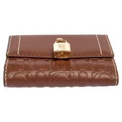 Pre Owned Carolina Herrera Tan Monogram Leather Matryoshka Lock Compact Wallet