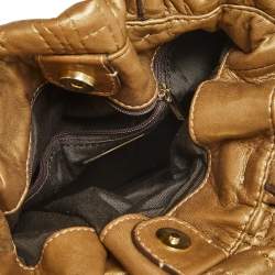 Pre Owned Carolina Herrera Gold Monogram Embossed Leather Bucket Bag