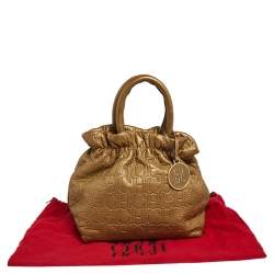 Pre Owned Carolina Herrera Gold Monogram Embossed Leather Bucket Bag