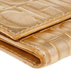 Pre Owned Carolina Herrera Metallic Gold Monogram Leather Tassel Trifold Wallet