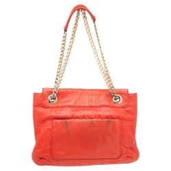 Pre Owned Carolina Herrera Orange Monogram Embossed Leather Audrey Shoulder Bag