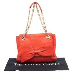 Pre Owned Carolina Herrera Orange Monogram Embossed Leather Audrey Shoulder Bag