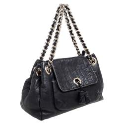 Pre Owned Carolina Herrera Black Monogram Embossed Leather Tassel Flap Shoulder Bag