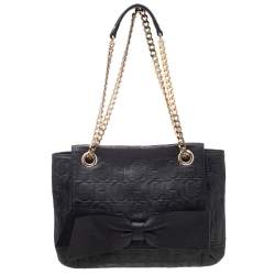 Pre Owned Carolina Herrera Black Monogram Embossed Leather Bow Flap Shoulder Bag