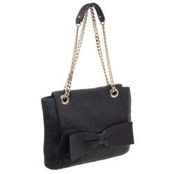 Pre Owned Carolina Herrera Black Monogram Embossed Leather Bow Flap Shoulder Bag