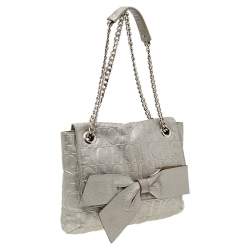 Pre Owned Carolina Herrera Silver Monogram Embossed Leather Bow Flap Shoulder Bag