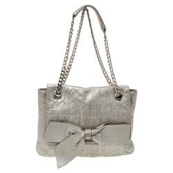 Pre Owned Carolina Herrera Silver Monogram Embossed Leather Bow Flap Shoulder Bag