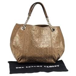 Pre Owned Carolina Herrera Gold Monogram Embossed Leather Chain Hobo
