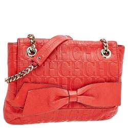 Pre Owned Carolina Herrera Orange Monogram Embossed Leather Bow Flap Shoulder Bag
