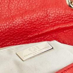 Pre Owned Carolina Herrera Orange Monogram Embossed Leather Bow Flap Shoulder Bag