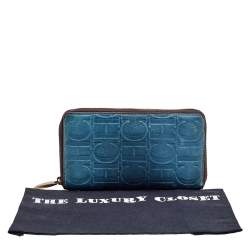 Pre Owned Carolina Herrera Blue Monogram Embossed Leather Zip Around Wallet
