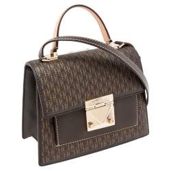 Pre Owned حقيبة كارولينا هيريرا يد علوية جلد وكانفاس مقوى مونوغرامي بني 