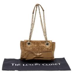 Pre Owned Carolina Herrera Gold Monogram Embossed Leather Audrey Bow Shoulder Bag