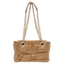 Pre Owned Carolina Herrera Gold Monogram Embossed Leather Audrey Bow Shoulder Bag