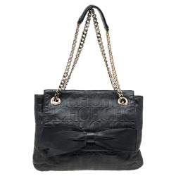 Pre Owned Carolina Herrera Black Monogram Embossed Leather Audrey Bow Flap Shoulder Bag