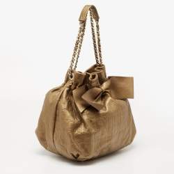 Pre Owned Carolina Herrera Metallic Bronze Embossed Leather Bow Bucket Shoulder Bag