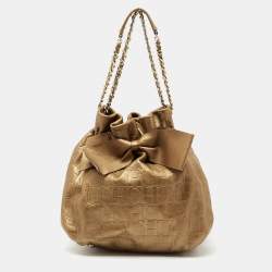 Pre Owned Carolina Herrera Metallic Bronze Embossed Leather Bow Bucket Shoulder Bag